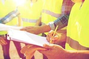 Construction Workers With Safety Vests