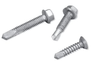 Different fasteners on white backdrop